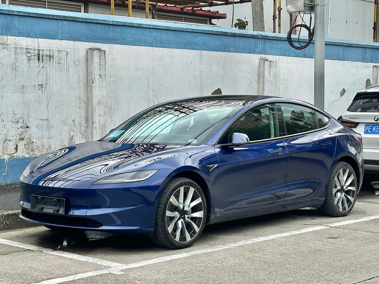 Facelifted Tesla Model 3 in dark blue